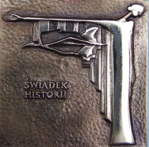 grafika przedstawia grawer nagrody Świadek Historii. Pobrano ze strony IPN 