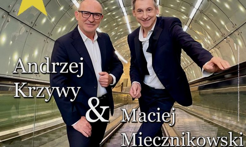 plakat promujący koncert 2manShow, przedstawia zdjęcie dwóch artystów w garniturach w tunelu podziemnym
