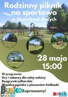 Plakat promujący piknik na dzień dziecka - fotografia przedstawia teren rekreacyjny 